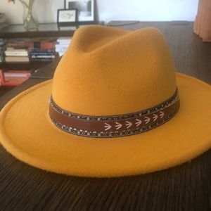 Never worn mustard colored fedora-ish hat